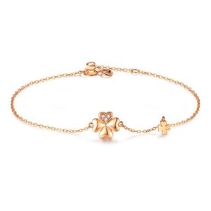 Lắc tay vàng 18K đính kim cương tự nhiên hình cỏ 4 lá